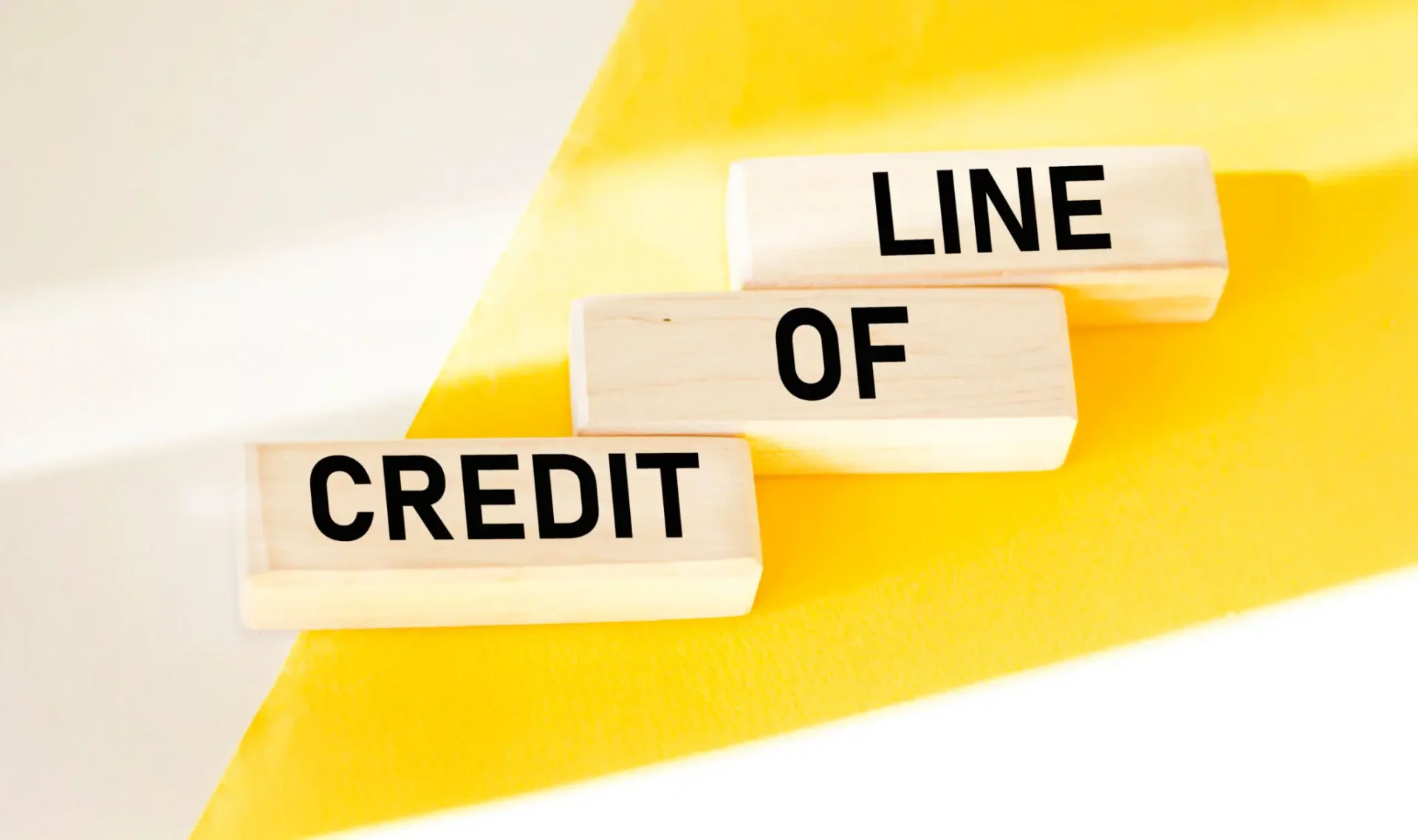b24ef010-86c7-4636-aa3c-7b05ac015710 (1) A close up of three blocks with the words line of credit